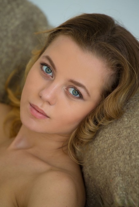 18 year old beauty Agnes takes great care in flaunting perky tits in the nude