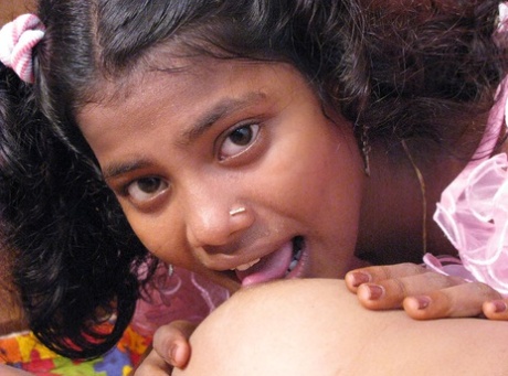 Indian lesbians tongue kiss before licking and toying vaginas