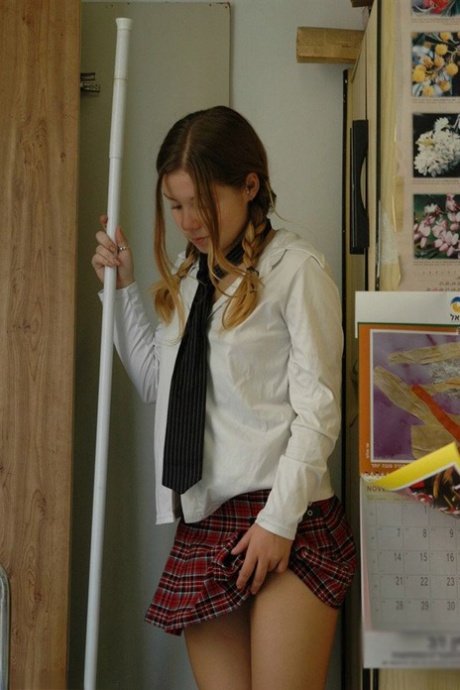 Barely legal student exposes her cotton underwear while watching pornography