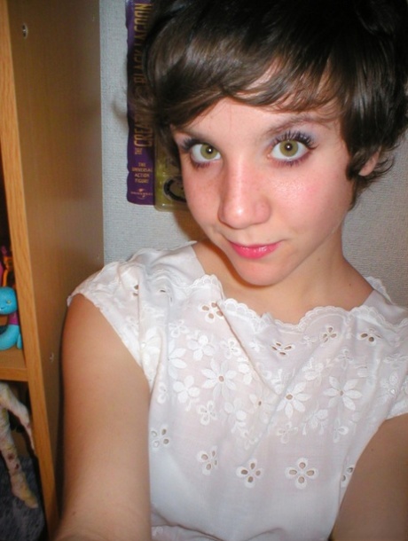 Pretty short-haired schoolgirl surprises with nude pics taken by herself