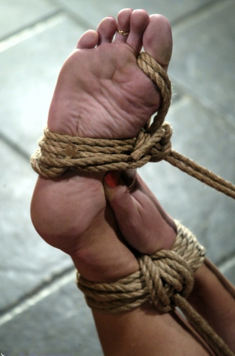 MILF Jenni Lee has her pussy vibrated to orgasm after an icing in rope bondage