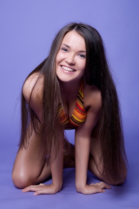 Glamorous babe Chantelle A shows her beautiful breasts & her bald pussy