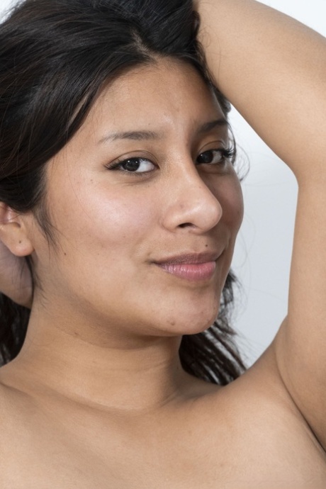 Curvaceous amateur Valentina shows off her hairy pussy & her juicy tits