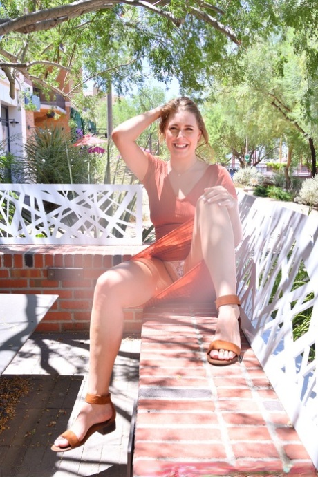 Glamorous brunette babe Sage flashing her panties and bra in public